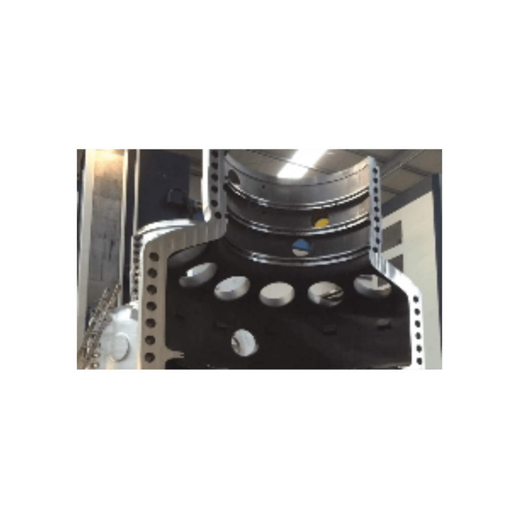 "Close-up of a complex industrial bearing assembly with multiple layers and bolted connections."